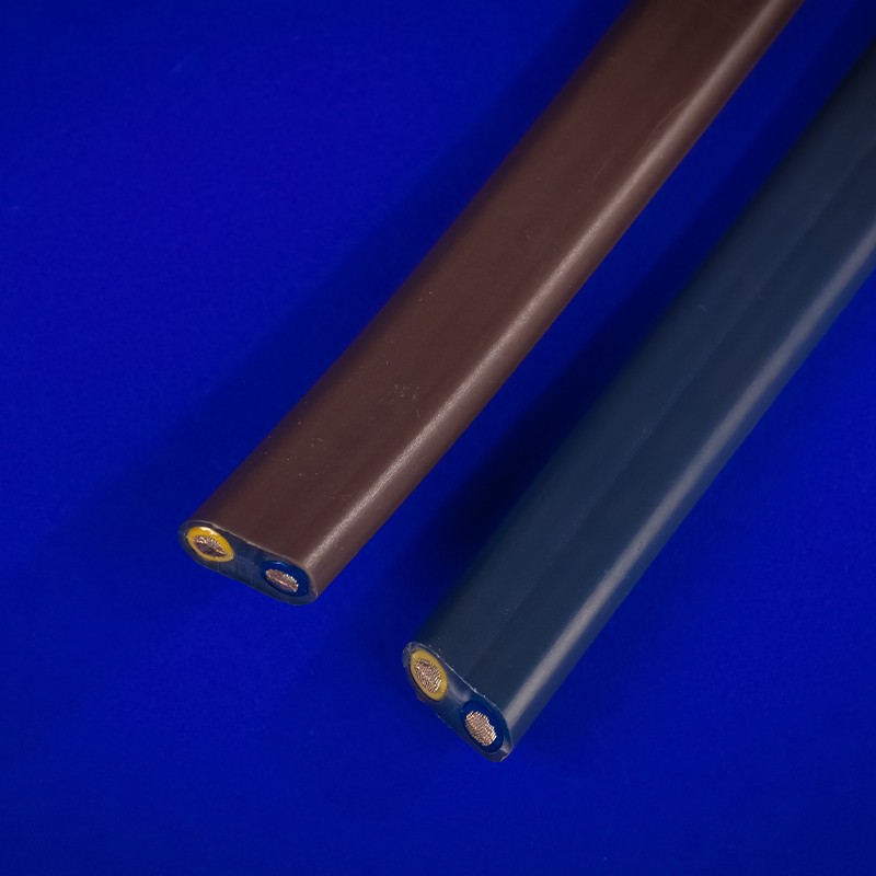 Dual-colored (grey and brown) wire designed for discreet blending in various environments. Boasts a 90°C temperature rating, ideal for outdoor, underground, or indoor residential use. Unique design prevents water leakage and oxidation, ensuring dura