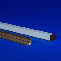 Corner aluminum extrusion with a specialized 90-degree lens, ensuring no light spill on countertops and providing a diode-free viewing experience.